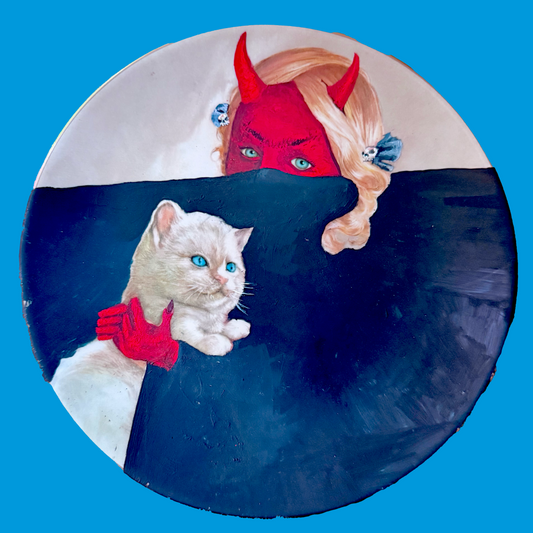 A decorative plate with a demon girl, cloaked horizontally in darkness, holding a cat.