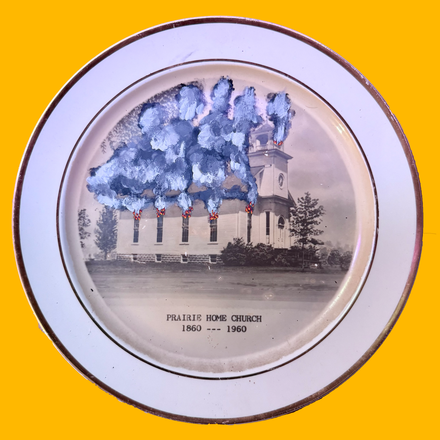 Decorative plate with a burning church illustration and text on a yellow background